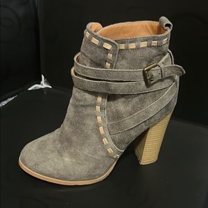Gray booties with tan stitching
